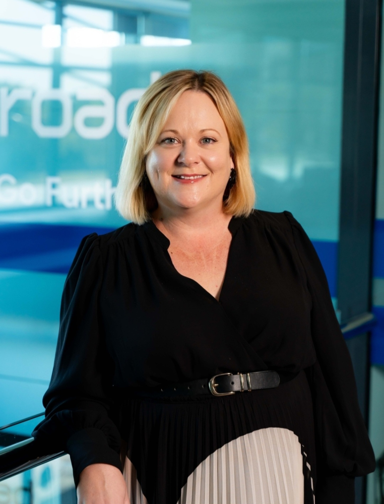 headshot of Sarah Green, General Manager of White Chalk Road, looking at the camera, head and shoulders