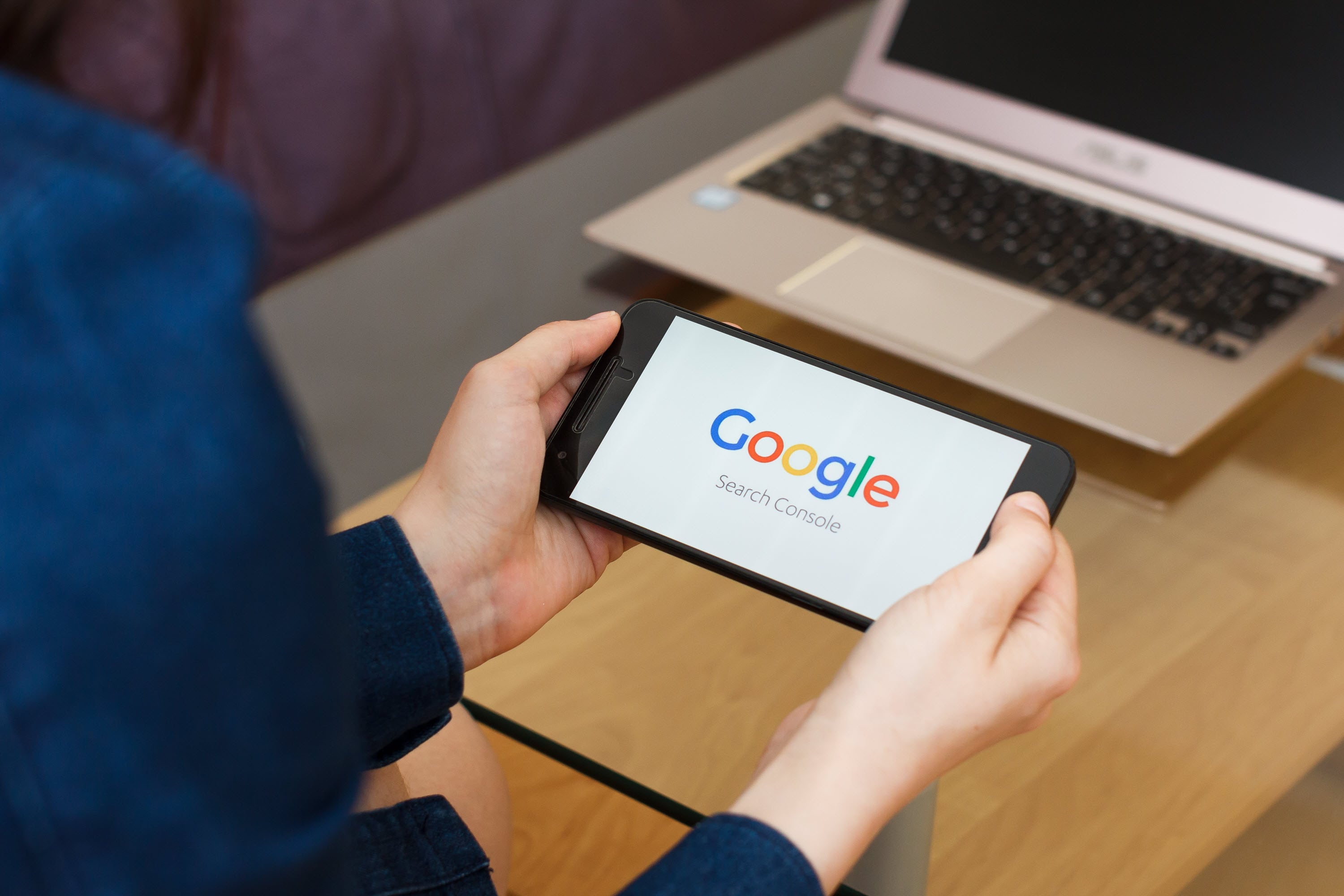 Your 2025 guide to Google Search Console 1 Computer and phone screen displaying Google Search Console.