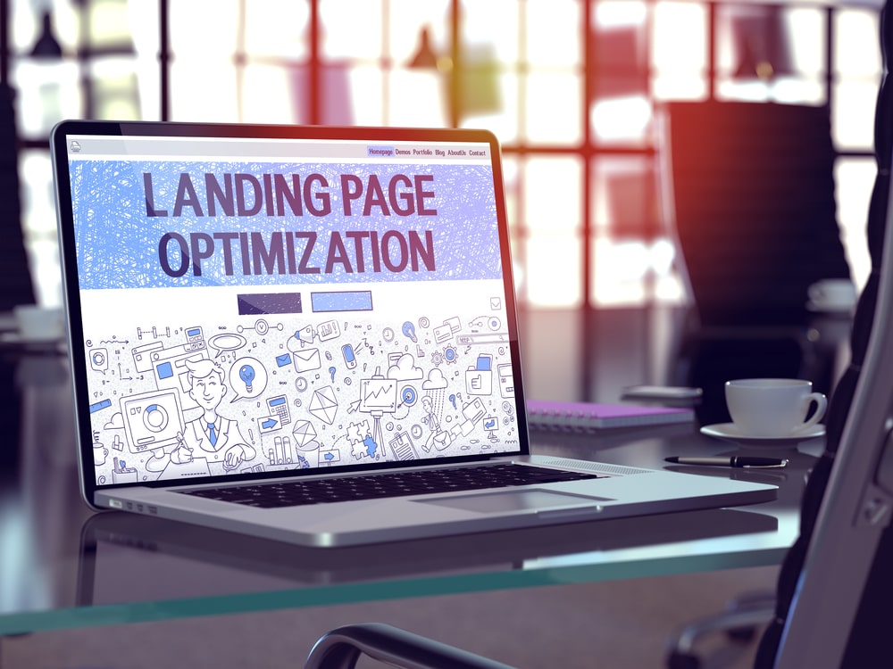 Open laptop with a website headline saying Landing page optimisation